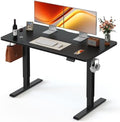 FEZIBO 55 x 24 Inchs Electric Standing Desk, Height Adjustable, Sit Stand Up, Computer Office Desk with Splice Board, Black Frame/Black Top by FEZIBO
