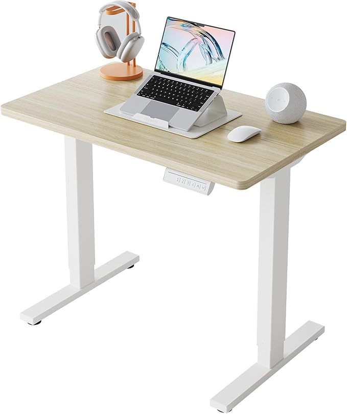 HUANUO 32x19 Inch Small Electric Standing Desk, Adjustable, Light Walnut | 176 Lbs Capacity, Rounded Corners, Wheel-Ready Feet, Compact Desktop, Apartment Workspace, 28.3–46.5 Inch Height Range by HUANUO