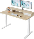 HUANUO 47.2" X 23.6" Electric Standing Desk with 2 Drawers, C-Clamp Mount Compatible, Height Adjustable Computer Desk, Home Office Stand Up Desk with 4 Preset Heights & 2 Hooks, Light Walnut by HUANUO