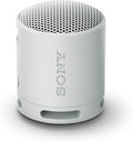 Sony SRS-XB100 Wireless Bluetooth Portable Lightweight Speaker, Light Gray | 16 Hr Battery, Super-Compact Travel Speaker, IP67 Waterproof & Dustproof Shower Speaker, Versatile Strap, Hands-free Calling by Unknown