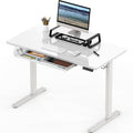 SHW 48-Inch Glass Electric Height Adjustable Standing Desk, White | w/ Monitor Riser | Memory Presets and Cable Management | Drawer with Built-in Compartments | Hanging Hooks by SHW