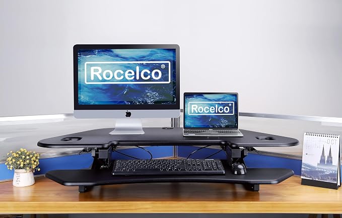 Rocelco 46" Height Adjustable Corner Standing Desk Converter with AC Outlet USB Charger and Anti-Fatigue Floor Mat - Sit Stand Up Tabletop Riser - Keyboard Tray - Black (R CADRB-46-ACUSB-MAFM) - Image 3